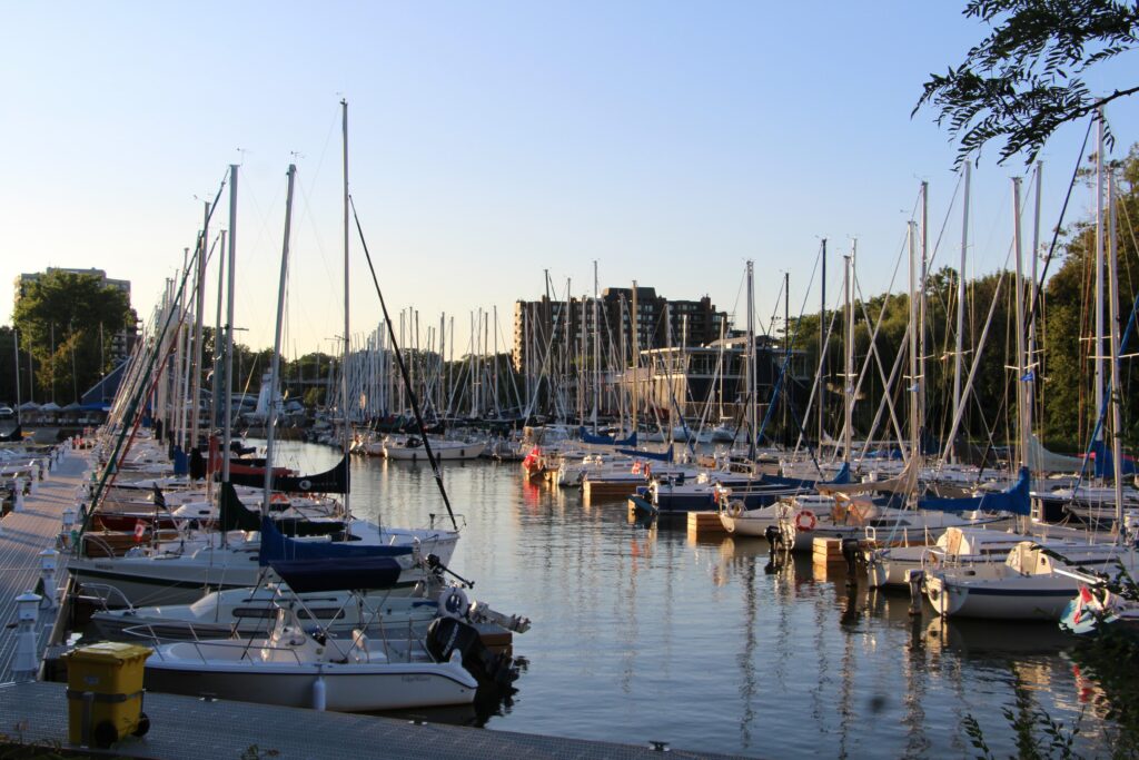 Lake Ontario waterfront with boats at dock - HVAC Oakville